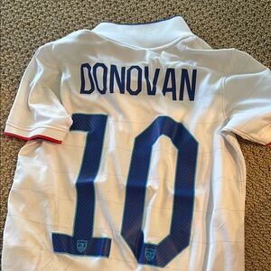 White USA Donovan Soccer Jersey with Blue Number 10